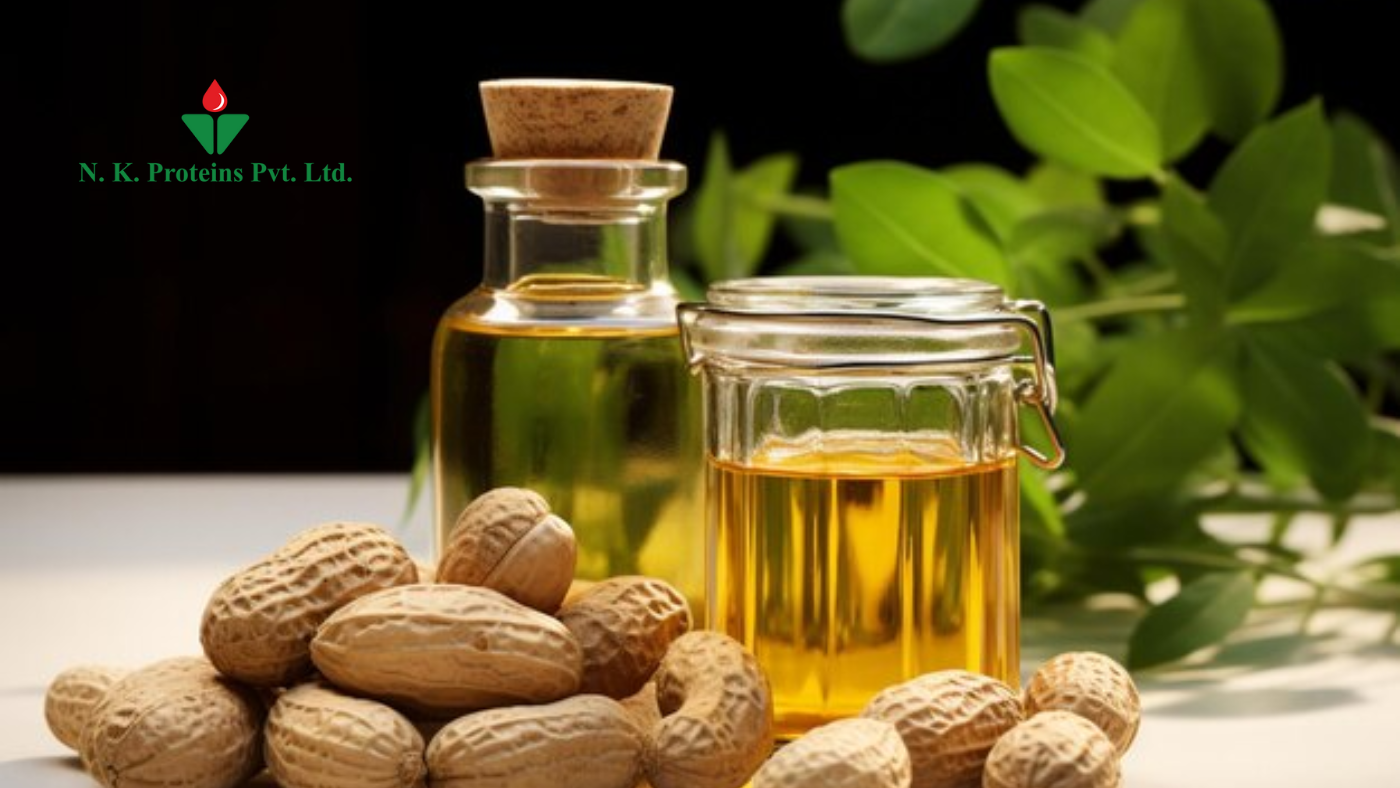 Peanut oil in glass jars with raw peanuts.